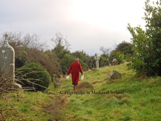 Local lady carring water from the well