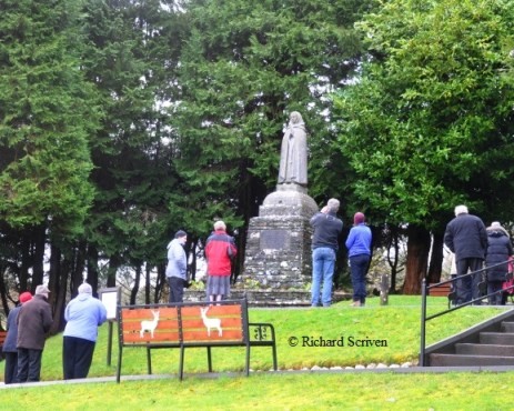 Pilgrims praying at the statue of St Gobnait as part of the rounds on St Gobnait’s Day (11th Feb) 2013.  