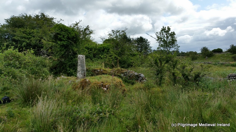 View of penitental cairn with ogham stone beside Tobar na Bachaile