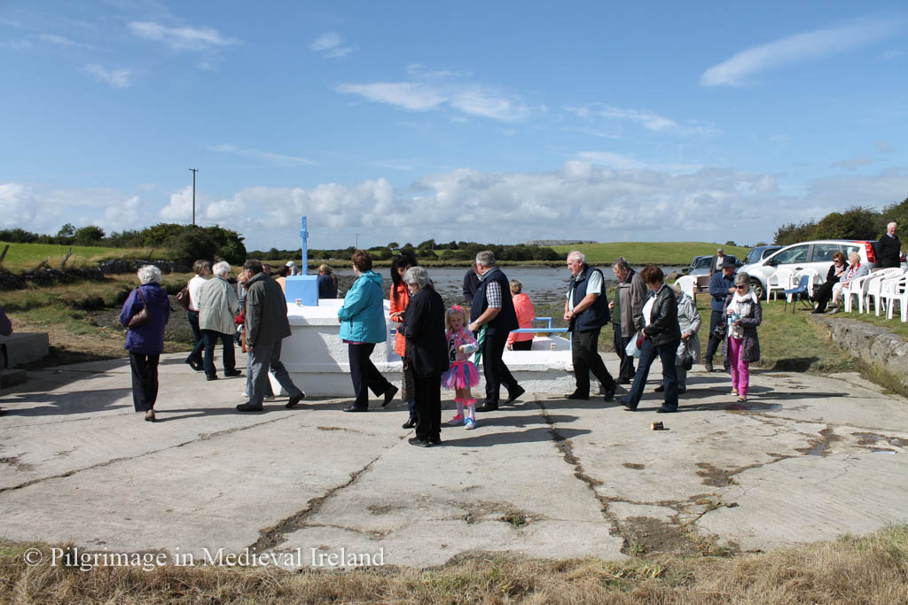 Fig. 2 Pilgrims performing the rounds at Barrigone holy well 15th August 2015